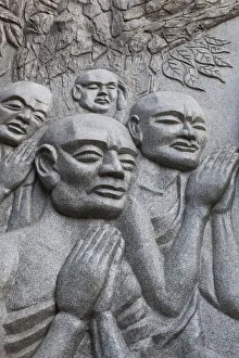Images Dated 17th January 2013: Vietnam, Nha Trang, Long Son Pagoda, Statue of Monks Preying