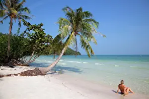 Viet Nam Prints: Vietnam, Phu Quoc, Mekong, A girl sitting on the sand at Sao Beach