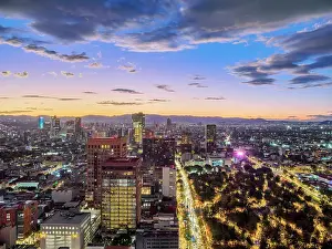 Central Park Prints: View over Alameda Central towards High-rise buildings of Paseo de la Reforma at dusk