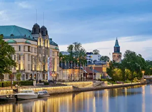 River Bank Prints: View over the Aura River towards the Cathedral at dusk, Turku, Finland