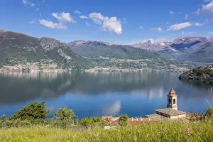 View of the bell tower and village of Dorio surrounded by Lake Como Province of Lecco