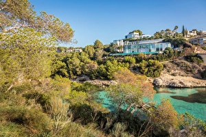 Soft Light Prints: View from Cala del Mago to the modern villas of Portals Vells