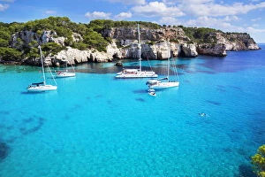 View of Cala Macarella and sailboat, Menorca; Balearic Islands; Spain; Europe