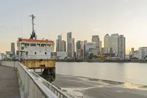 Greenwich Peninsula Prints: A view of Canary Wharf and A slice of reality sculpture by Richard Wilson