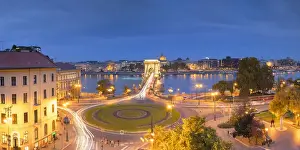 View of Chain Bridge (Szechenyi Bridge) and River Danube at dusk, Budapest, Hungary