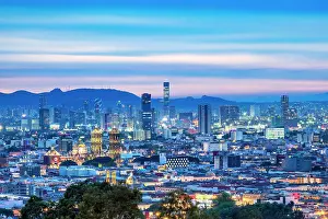 Nightfall Prints: View over the city towards the cathedral and high rise buildings at dusk