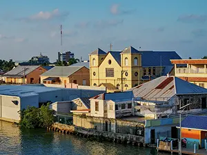 View over Collet Canal towards the Holy Redeemer Cathedral at sunset, Belize City, Belize District, Belize