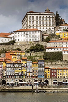 View over the colorful buildings of Ribeira district and Episcopal Palace, Porto