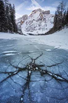 Bozen Prints: A view of Croda del Becco from Braies lake during winter at sunrise, Braies, Bolzano