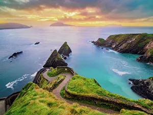 View over Dunquin Pier towards Blasket Islands at dusk, Dingle Peninsula, County Kerry, Ireland