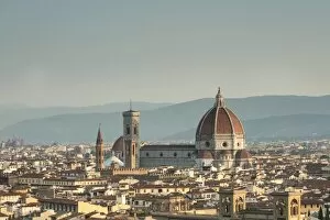 View of the Duomo with Brunelleschi Dome and Basilica di Santa Croce from Piazzale