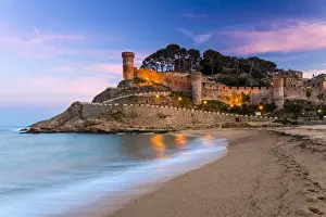 View at dusk of Vila Vella, the medieval old town of Tossa del Mar, Costa Brava, Catalonia