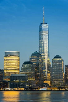 View at dusk of One World Trade Center and Lower Manhattan financial center, Manhattan