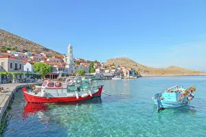 Emporio Prints: View of Emporio harbour and Saint Nicholas church in the distance