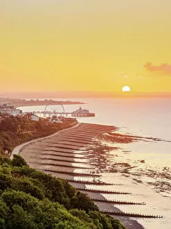 Trail Gallery: View towards Ferris Wheel and Eastbourne Pier at sunrise, Eastbourne, East Sussex, England