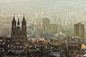 Ecuadorian Prints: View form Panecillo Hill at sunrise towards La Basilica Del Voto Nacional, Quito, Ecuador