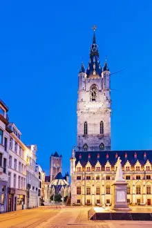 View of Ghent Belfort (beffroi) and Monument Jan Frans Willems by night, Belgium