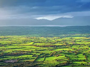 Loneliness Prints: View over the green fields towards the Atlantic Coast from the top of the Strickeen Mountain