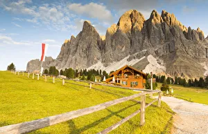 a view of the Gschnagenhardtalm (Malga Casnago) with Geisler Group in the background a view of the Gschnagenhardtalm (Malga Casnago) with Geisler Group in the background