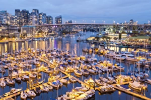 Vancouver Prints: View over harbour & Granville Island with city skyline at dusk
