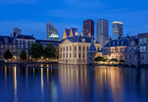 View over Hofvijver towards Mauritshuis Art Museum and City Center, twilight, The Hague