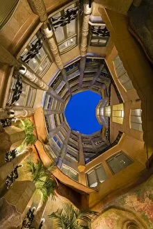 Images Dated 5th November 2014: Bottom view of the inner courtyard of Casa Mila or La Pedrera at dusk, Barcelona