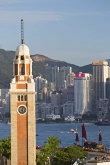 View of Former KCR clock tower and Hong Kong Island skyline, Hong Kong, China