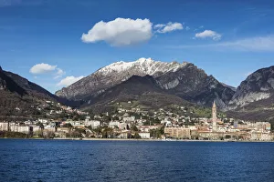View of Lake Como surrounding the city of Lecco framed by snowy peaks Lombardy Italy View of Lake Como surrounding the city of Lecco framed by snowy peaks Lombardy Italy