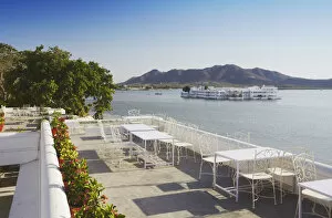 Images Dated 4th July 2011: View of Lake Palace Hotel from Jagat Niiwas Palace Hotel rooftop restaurant, Udaipur