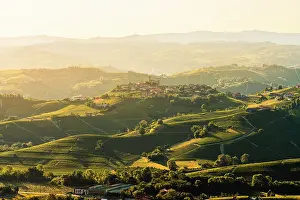 Rolling Hills Prints: View of the Langhe hills and the village of Castiglione Falletto at dawn