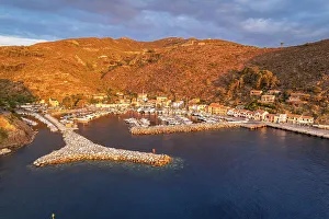 Tyrrhenian Prints: View of the marina of Capraia island at sunrise
