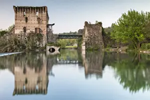 View of the medieval town of Borghetto sul Mincio and the Visconti bridge