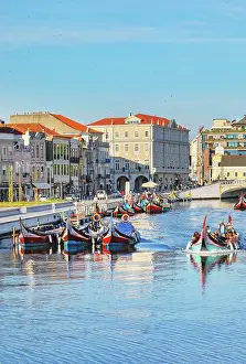 Aveiro District Prints: View of moliceiro boats floating on Aveiro river main lagoon, Aveiro, Portugal