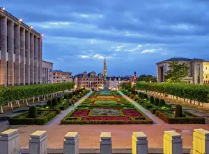View over Mont des Arts Public Garden towards Town Hall Spire at dusk, Brussels, Belgium