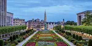 View over Mont des Arts Public Garden towards Town Hall Spire at dusk, Brussels, Belgium