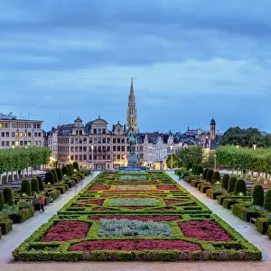 View over Mont des Arts Public Garden towards Town Hall Spire at dusk, Brussels, Belgium