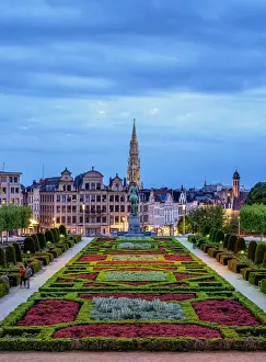 View over Mont des Arts Public Garden towards Town Hall Spire at dusk, Brussels, Belgium