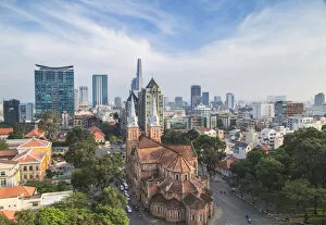 Images Dated 17th February 2015: View of Notre Dame Cathedral and city skyline, Ho Chi Minh City, Vietnam