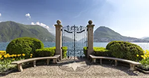View of the old gates of Parco Ciani in Lugano city on a spring day, Canton Ticino View of the old gates of Parco Ciani in Lugano city on a spring day, Canton Ticino