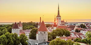 Tallinn Prints: View over the Old Town towards St Olafs Church at sunrise, Tallinn, Estonia