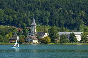Osterrreichisch Prints: View at Ossiach with Benedictine abbey from Bodensdorf, Carinthia, Austria