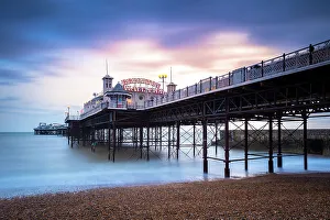 View of the Palace pier at sunset. Brighton, East Sussex, Southern England, United Kingdom