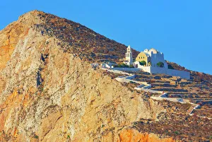 Folegandros Prints: View of Panagia Kimissis church built on a cliff above the sea