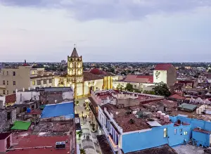View over Pedestrian Calle Maceo towards Nuestra Senora de la Soledad Church at dusk