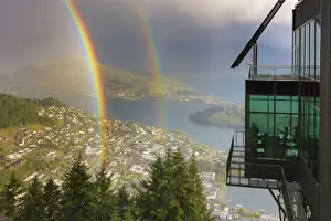 Observation Deck Prints: View of Queenstown and Wakatipu lake with a double rainbow at sunset, Otago, South Island