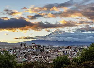 Images Dated 9th October 2018: View over Riobamba towards Chimborazo Volcano at sunset, Chimborazo Province, Ecuador