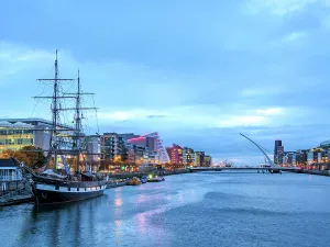 Wharf Prints: View over River Liffey towards The Jeanie Johnston Coffin Ship and Samuel Beckett Bridge at dawn
