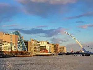 Bank Prints: View over River Liffey towards Samuel Beckett Bridge and The Convention Centre at sunset