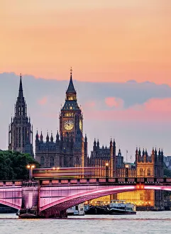View over the River Thames towards the Palace of Westminster at dusk, London, England, United Kingdom