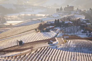 Cuneo Province Prints: View of the road to the castle of Grinzane Cavour in winter after a snowfall